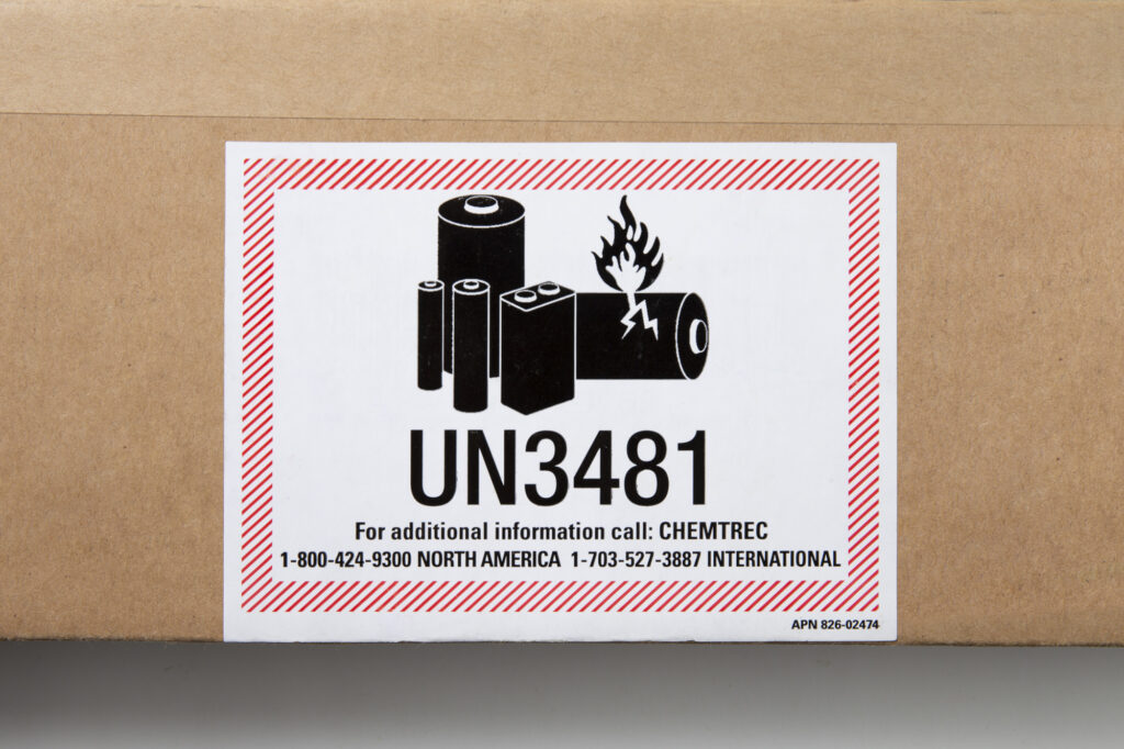 Close up of printed UN3481 sticker label about Lithium batteries