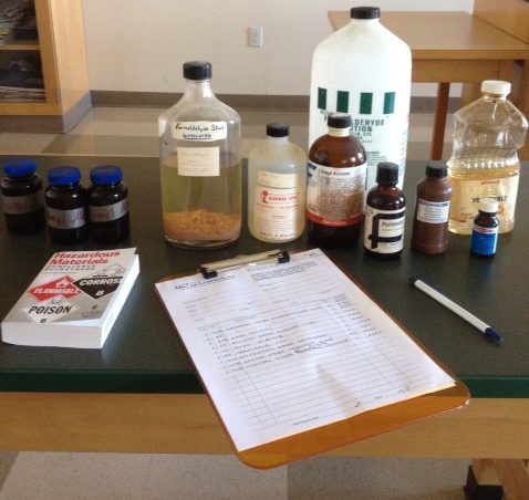 lab with bottles and clipboard